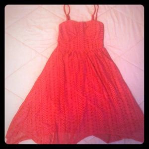 Soft, red dress with designs